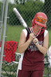 girl playing softball