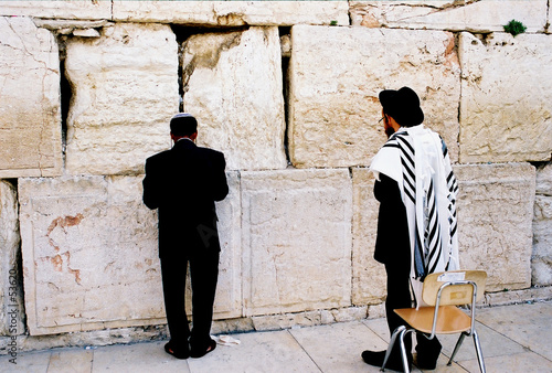 jews are praying by the western wall, jerusalem jews are praying by the western wall, jerusalem