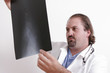 doctor looking at a film