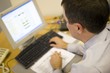 man using office computer
