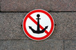 anchor sign on the river bank