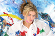 beautiful young woman splashed in paint