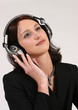businesswoman listening to her favorite music businesswoman listening to her favorite music
