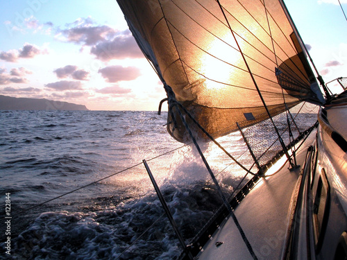 Fototapeta sailing to the sunrise