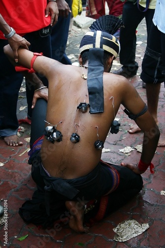 Photo: thaipusam devotees walk thaipusam devotees walk