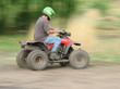 man on a quad bike turning