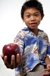 kid offering apple