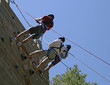 three climbers on belay