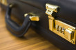 closeup of briefcase: lock in focus closeup of briefcase: lock in focus