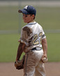 the ball player covered with dirt.