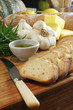 Photo: garlic bread, knife & rosemary oil 2 garlic bread, knife & rosemary oil 2