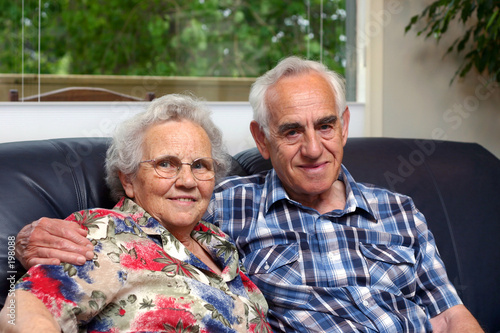 an elderly couple/grandparents.