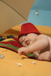 baby resting atthe beach