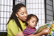 mother and son reading together mother and son reading together