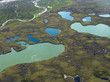the view of tundra from a helicopter the view of tundra from a helicopter