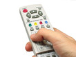 hand holding a remote hand holding a remote