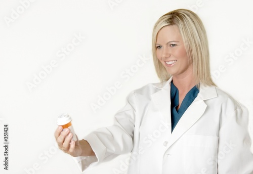 lady pharmacist offering medication