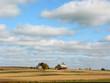 farm house and fields under blue sky farm house and fields under blue sky