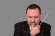 orchestra conductor deep in thought