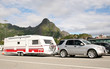 Images : luxury car caring caravan with bikes on