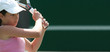 young girl playing tennis