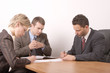 business meeting - 3 people - signing contract - g