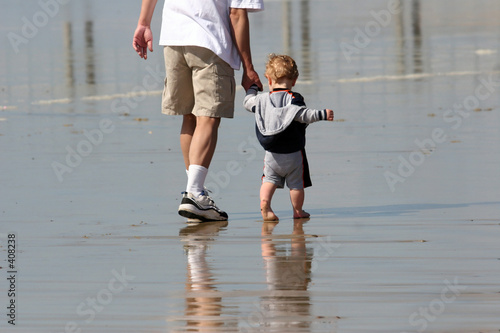 Photo: father and son on the beach father and son on the beach