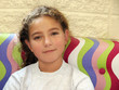 cute girl sitting on a couch