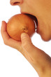 biting into an onion
