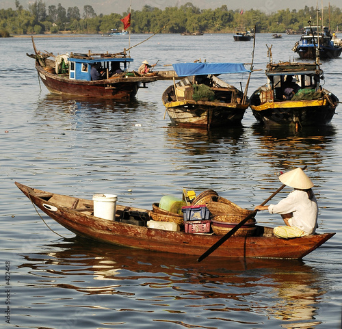 Photo: vietnam, hoi an: women going to the market vietnam, hoi an: women going to the market