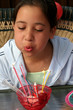 birthday girl blowing out candles