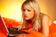 sexy blonde using laptop computer
