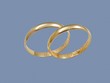 wedding rings on gray background