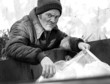 homeless man - roots in dumpster b&w