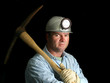 coal miner with pickax - in the dark coal miner with pickax - in the dark