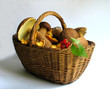basket full of mushrooms and berries basket full of mushrooms and berries