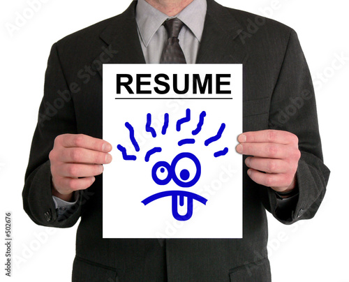 Photo: businessman presentation (resume - silly face) businessman presentation (resume - silly face)