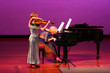 2 women playing at the concert