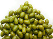delicious group of shinny olives over a white back