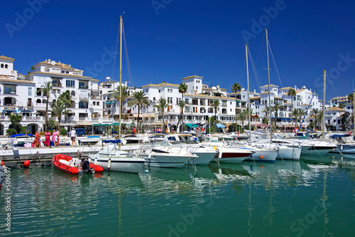 boats and yachts moored in duquesa port in spain on the costa de