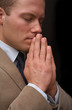 man praying.