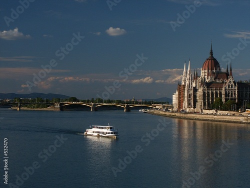Photo: ship passing in front of hungarian parliament ship passing in front of hungarian parliament
