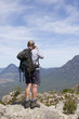 old man photographer on mountain top 2