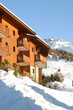 chalet in deep snow of winter
