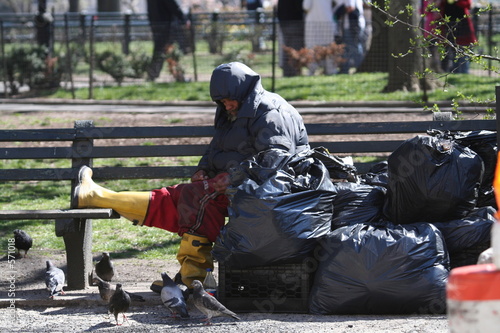 homeless with pigeons
