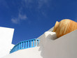 vase set in whitewashed wall, santorini, greece