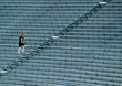 man running bleachers