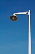 lamppost over the blue sky
