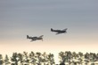 spitfire and mustang at sunset