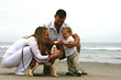 family on beach with dog 2